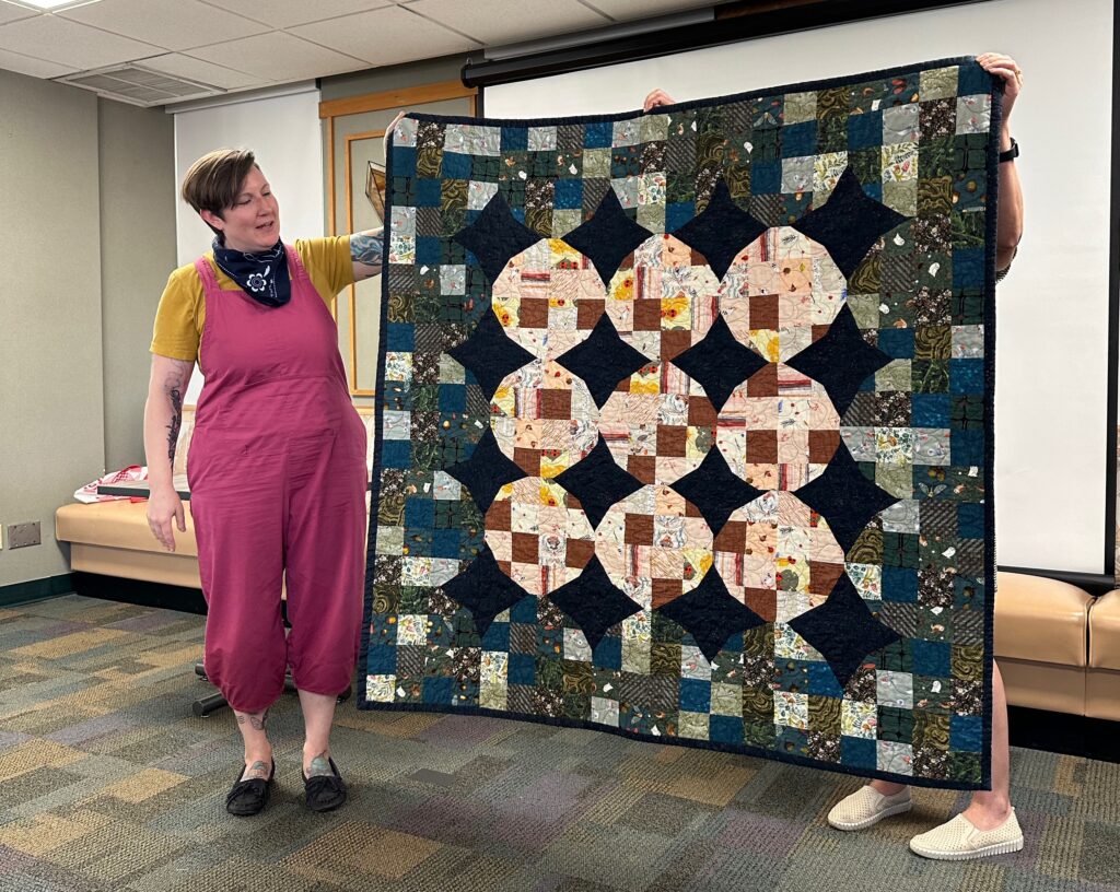 Sam Luchsinger finished their "Forest Floor" quilt